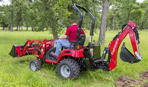 Ground clearance for the 1499-pound. . Mahindra emax 20 backhoe attachment